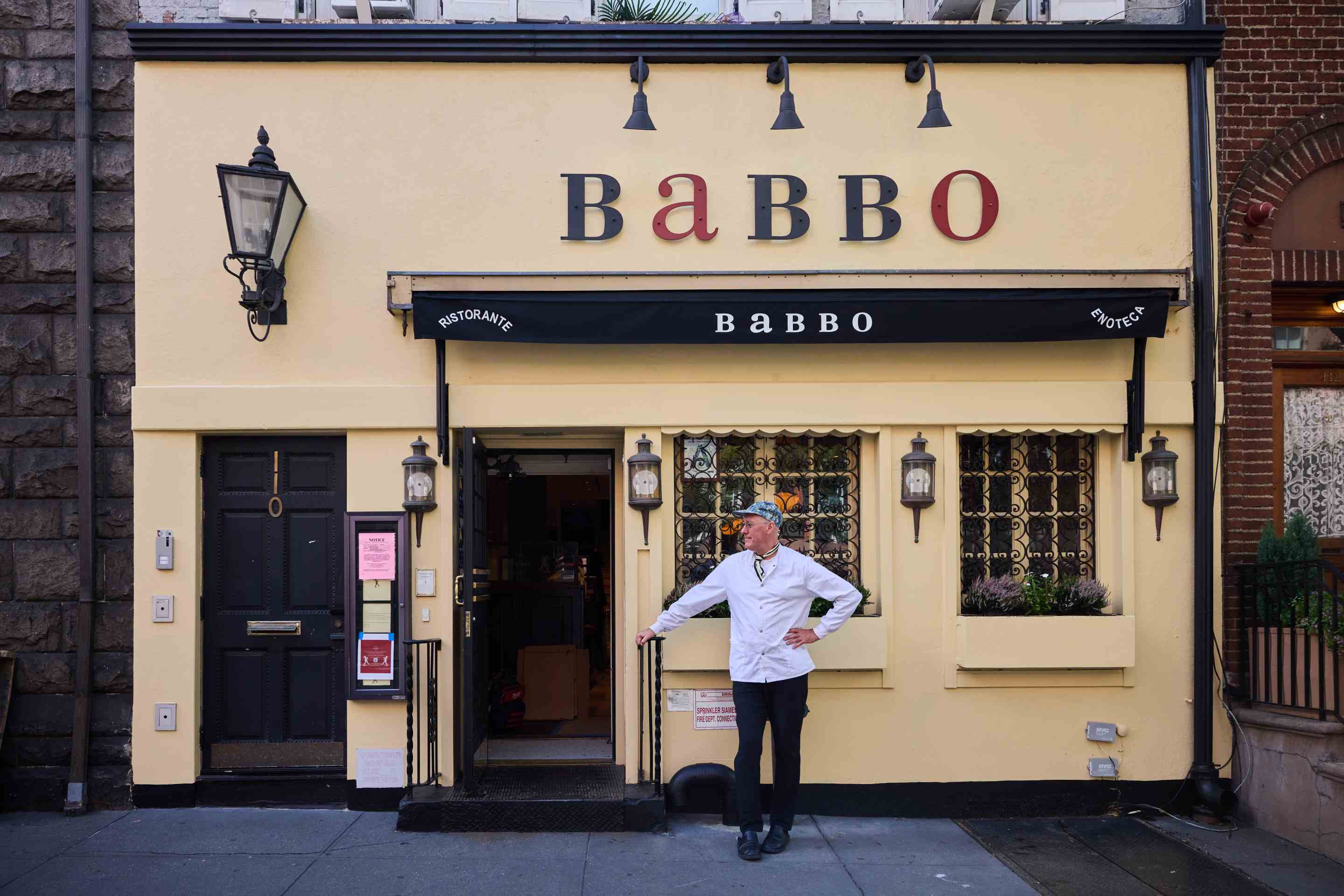 Chef Mark Ladner standing outside Babbo restaurant in New York City.