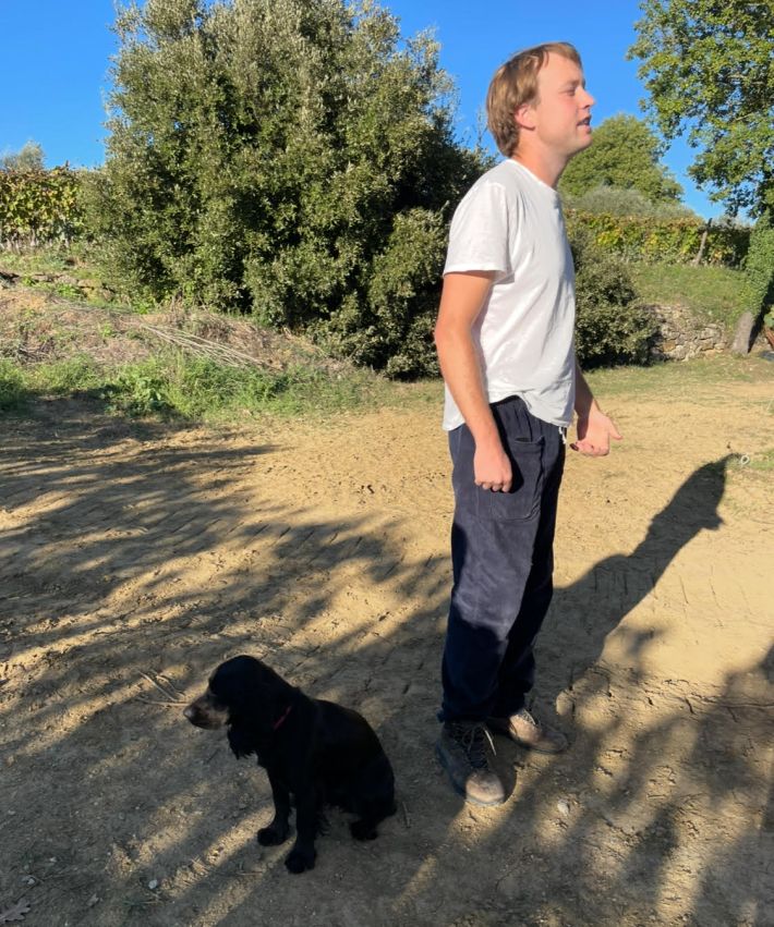 James Marshall Lockyer of Tenuta Licinia on his property with one of his pups.