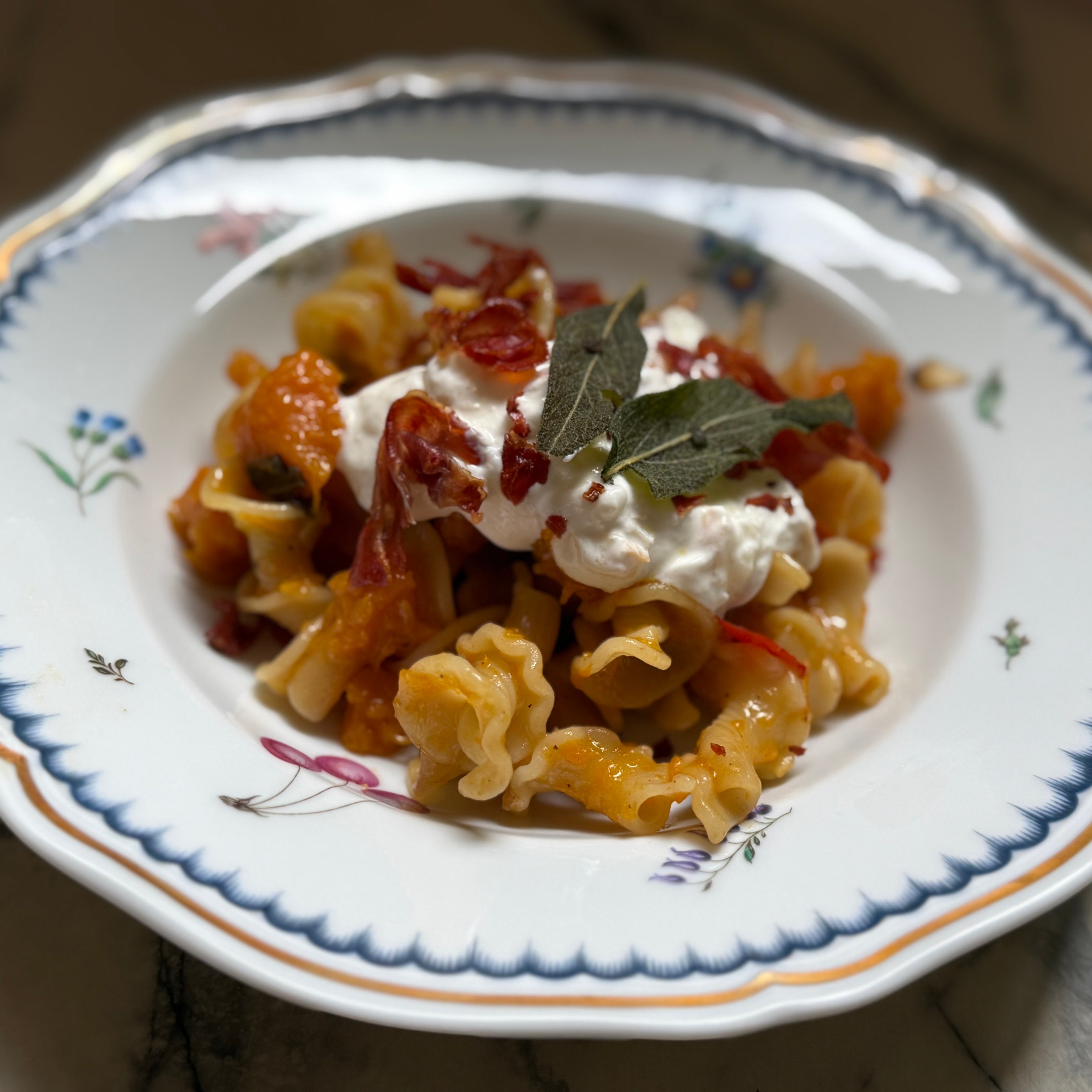 Butternut Squash Pasta with Smoked Lioni Stracciatella, Crispy Sage & Prosciutto by Joanna Moeller.