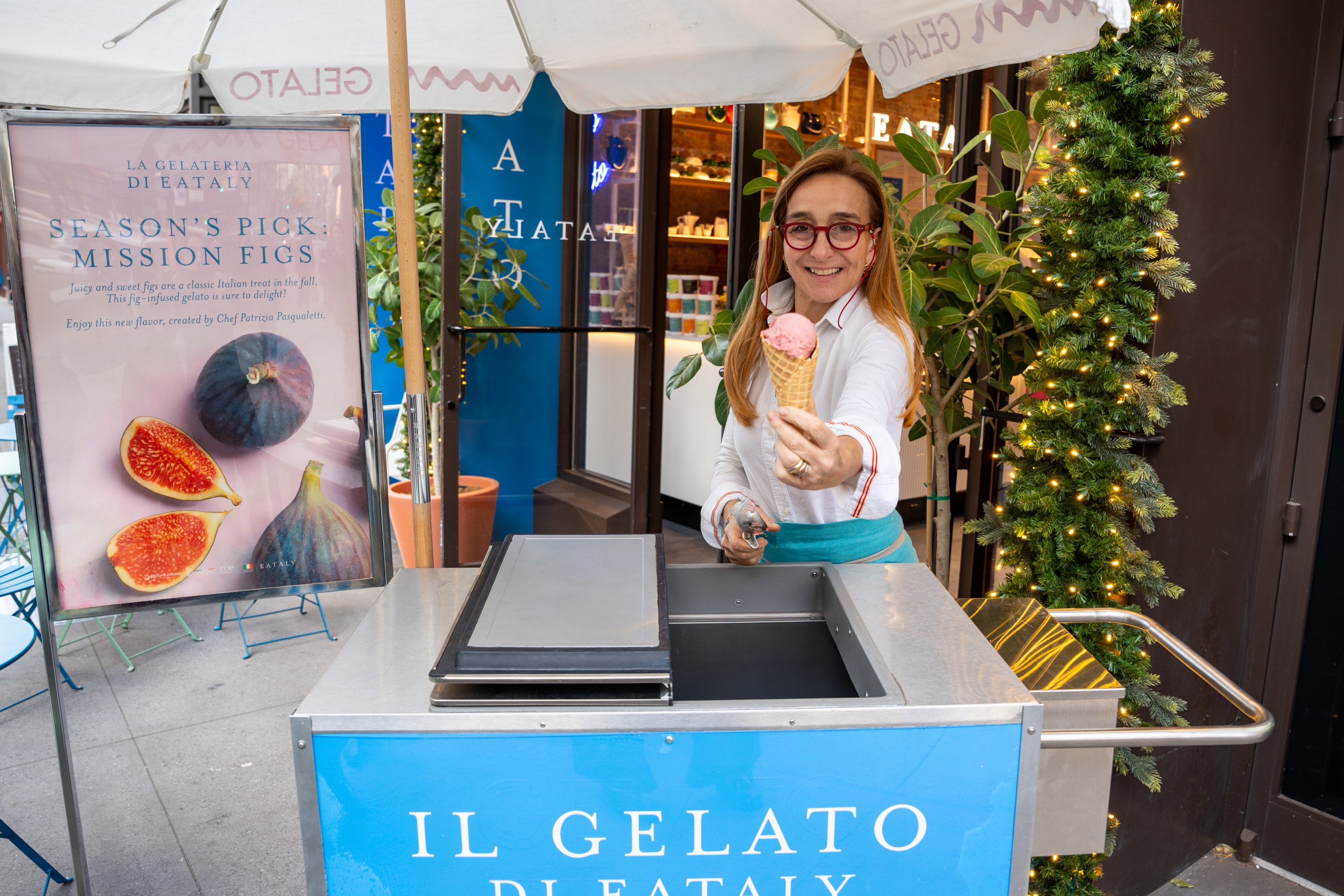 Patrizia Pasqualetti offering a gelato cone outside Eataly Flatiron
