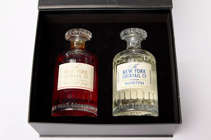 Negroni and Vesper Martini bottles in a black gift box from The New York Cocktail Co.