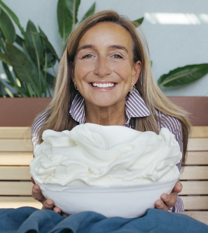 Gelato Chef Patrizia Pasqualetti holding a bowl of gelato.