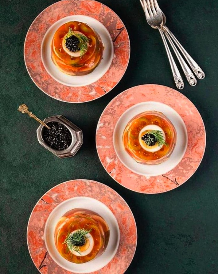 A refined savory aspic ring, finished with quail egg, dill, and caviar. Photo credit: Jennifer Arce Photography
