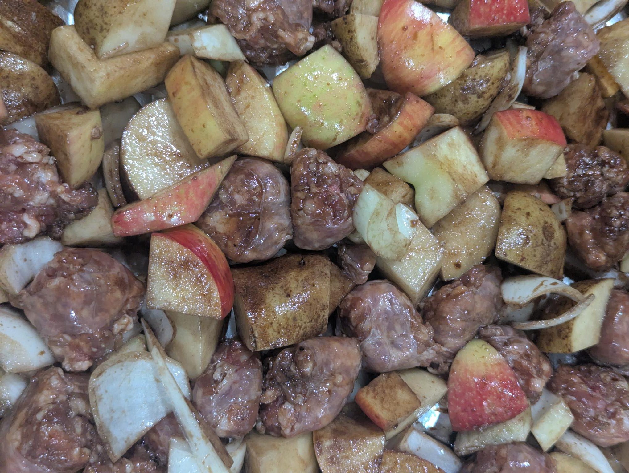 Italian fennel sausage roasted with apples, onions, potatoes, and fennel in a simple one pan tray bake.