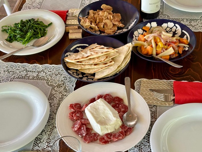 Piadina served with seasonal vegetables at Sovescio in Romagna.