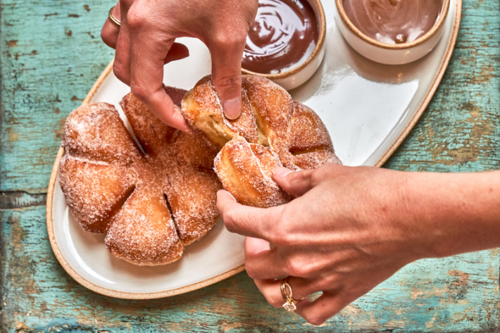 Sugar-dusted bomboloni with chocolate amaro dipping sauce at Ci Siamo in Hudson Yards, NYC.