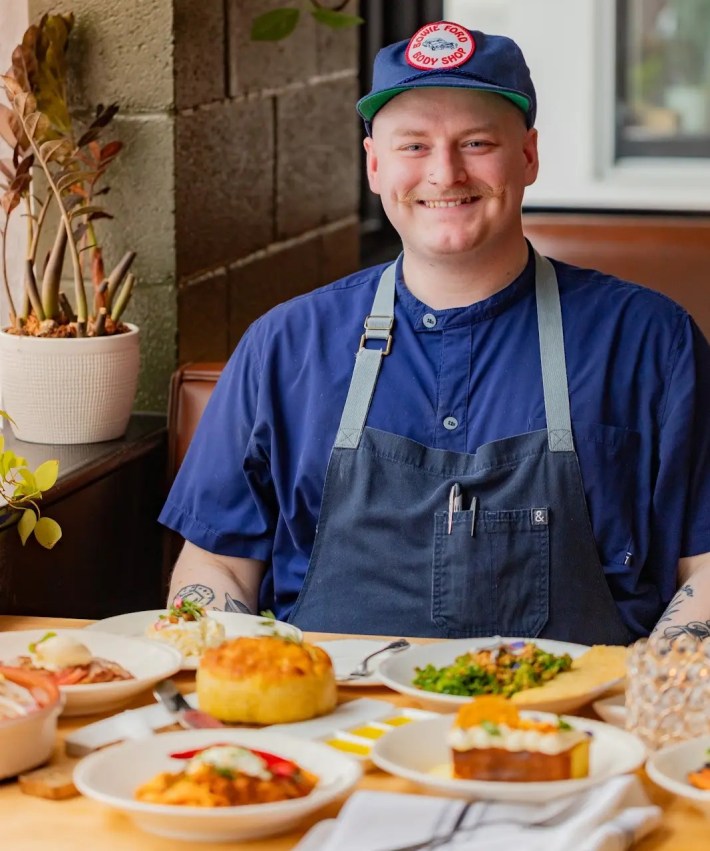 Executive Chef Sam Sheehan seated at Ever Andalo restaurant in Charlotte.