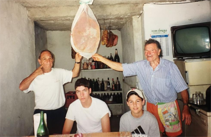 A young Stefano (second from the left) with family and a friend in Italy.