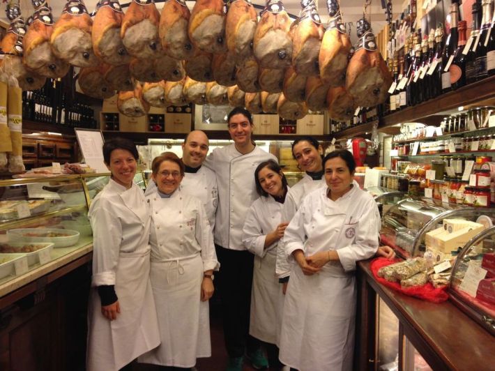 Stefano (center) with co-workers and Nonna Laura Morandi (second from left) at Hosteria Giusti in Modena.