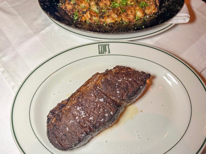 Wagyu zabuton steak with crispy smashed potatoes at Ezio’s Miami Beach steakhouse