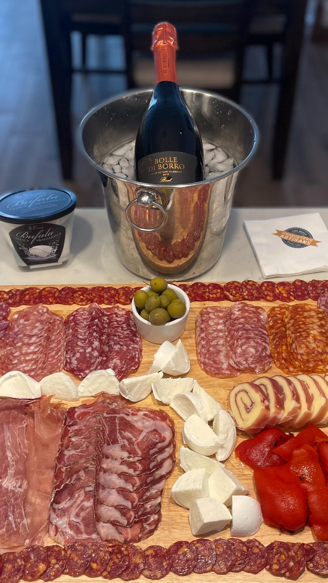 A "Super" charcuterie board and a sparkling rose from Il Borro.
