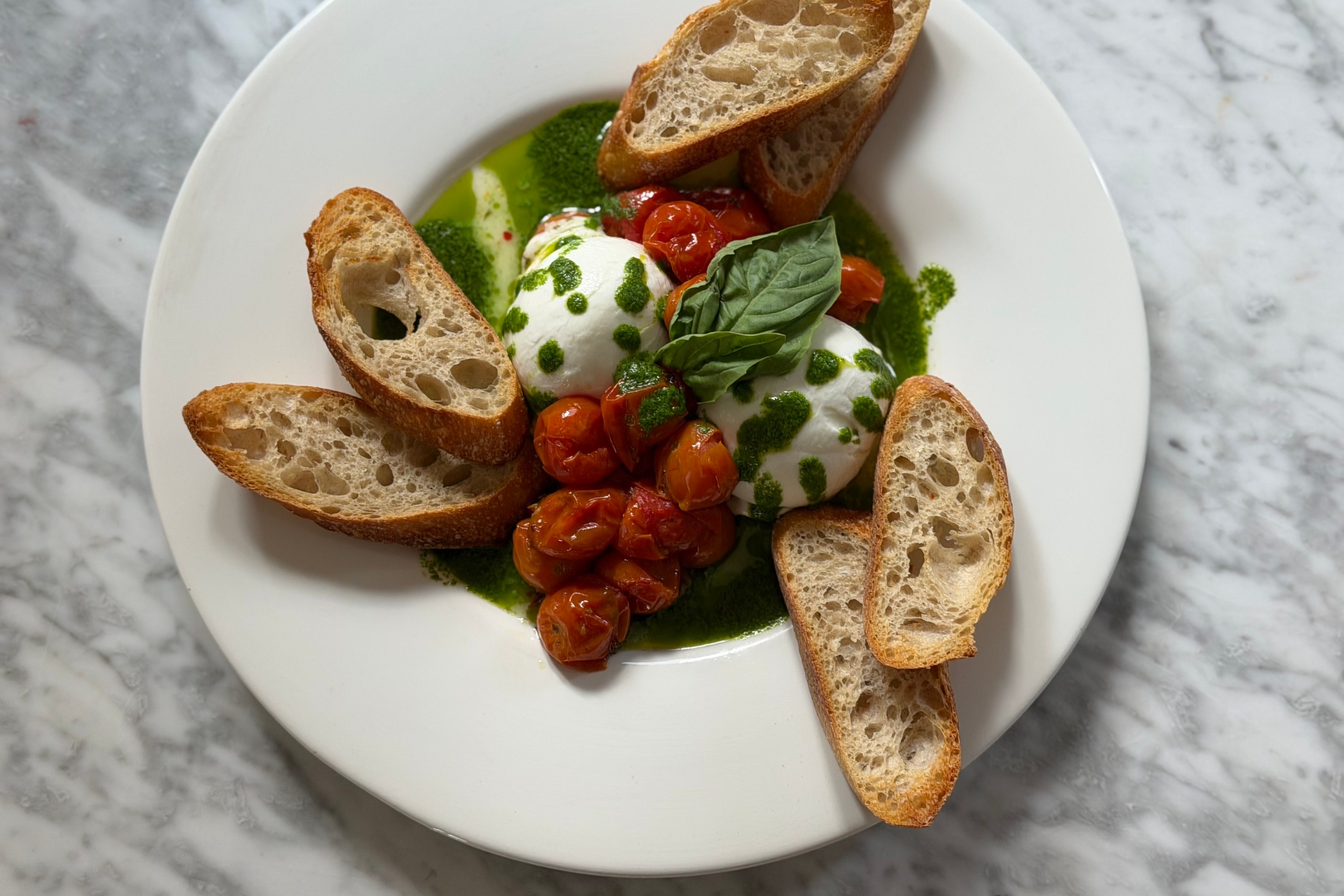 Fresh Buffalo Mozzarella with Honey Bomb Tomato Confit & Basil Oil