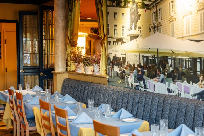 Tables set for service inside Parma Ristorante. Photo credit: Patty Schmidt Photography