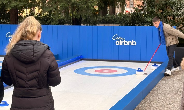 Curling activity at Casa Airbnb event space in Milan