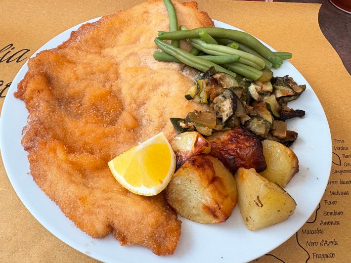 Chicken Milanese with vegetables and potatoes at Milan park cafe