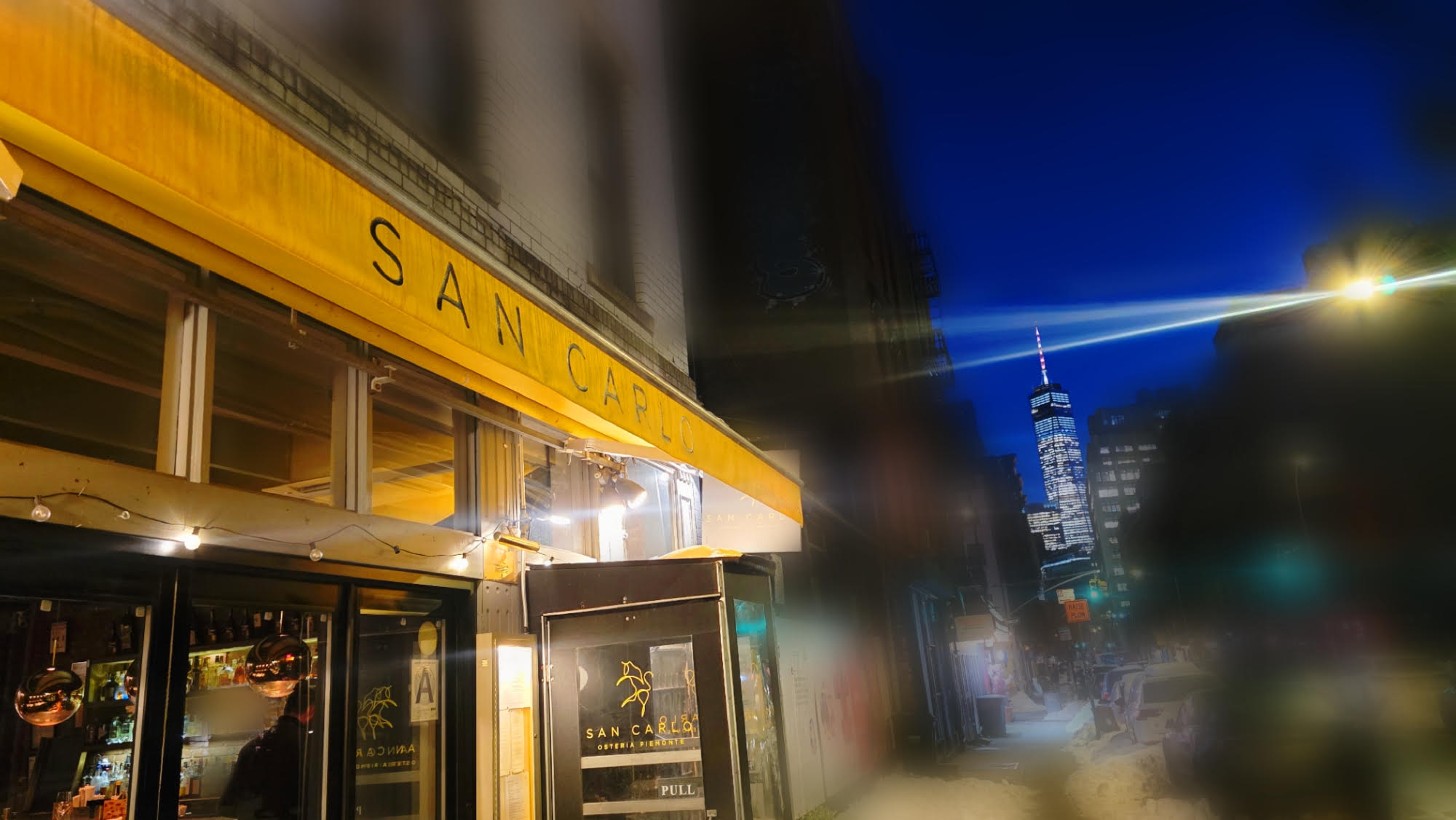 The facade of San Carlo Osteria Piemonte in NYC's SoHo neighborhood. Photo by Krista Zangari.