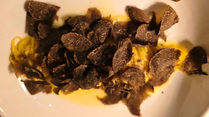 Tajarin pasta under a shaving of black truffles at San Carlo Osteria Piemonte. Photo by Krista Zangari.