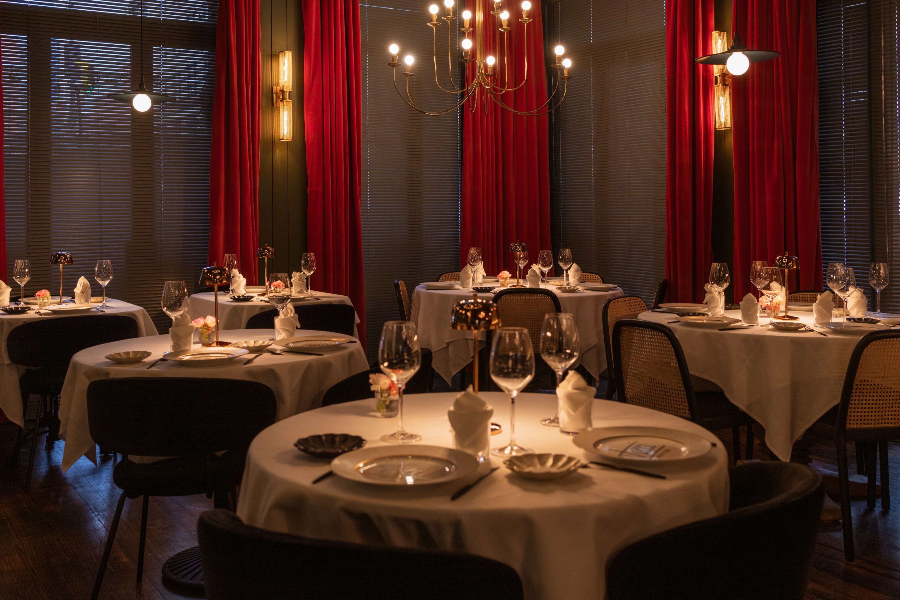 Candlelit dining room at Tucci Italian restaurant in New York City