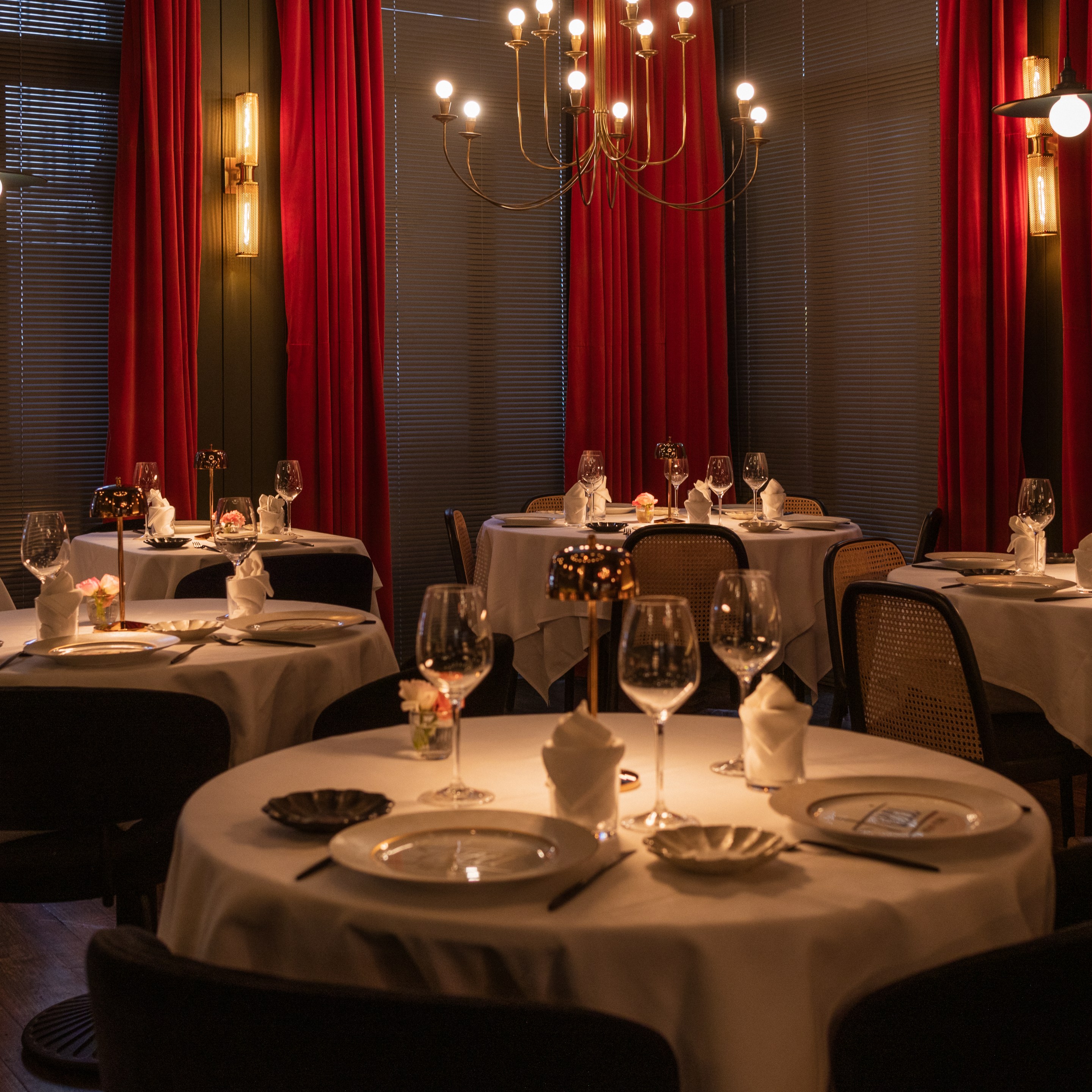Candlelit dining room at Tucci Italian restaurant in New York City