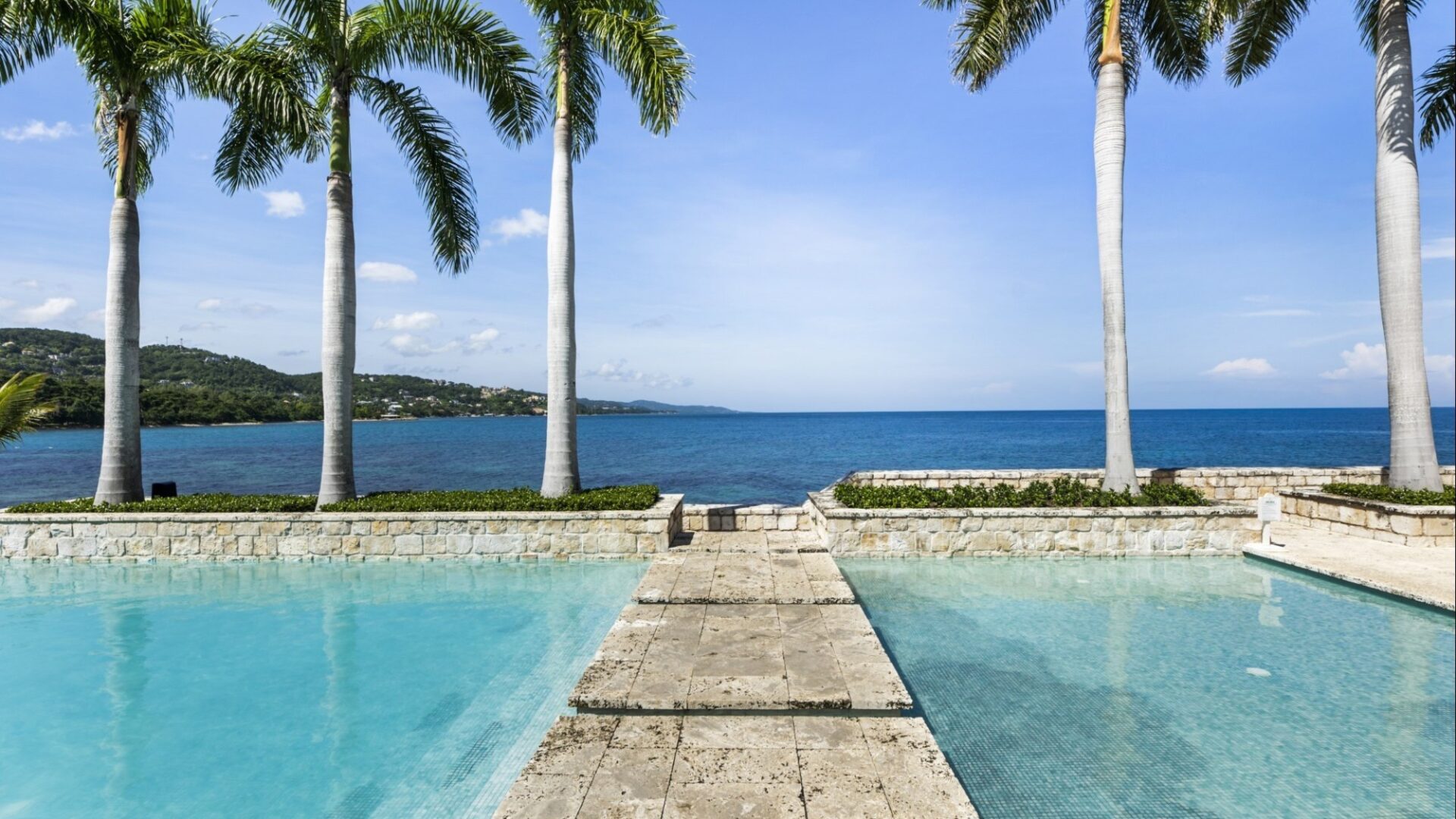 Infinity pool overlooking the ocean at Round Hill Hotels and Villas in Jamaica.