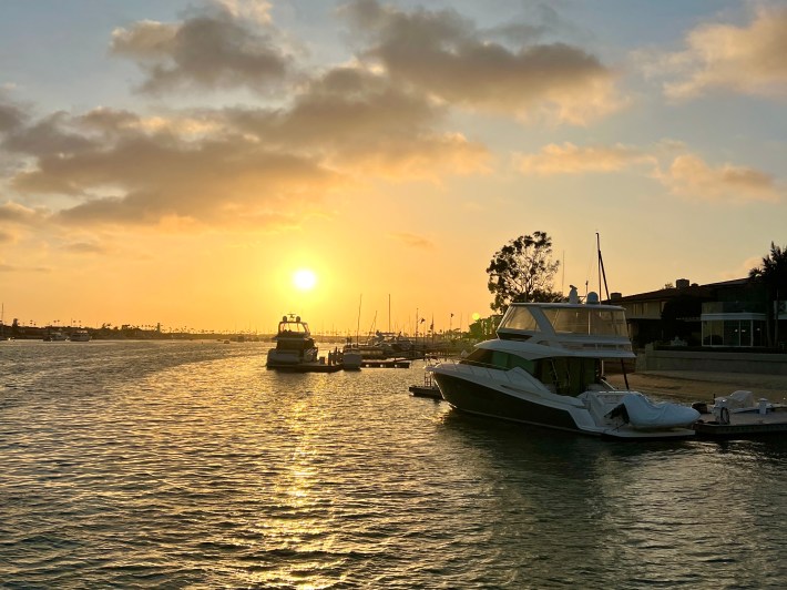 Yachts in the harbor at sunset. Photo credit: Patty Schmidt Photography