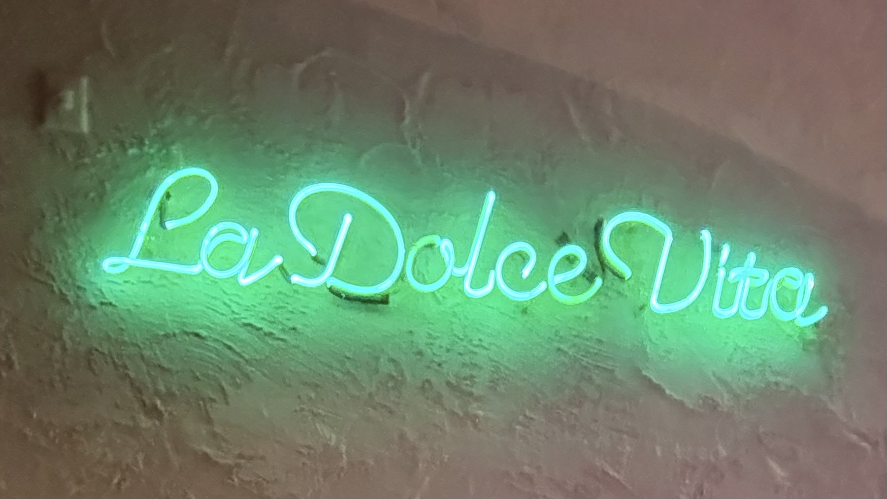 The glowing neon sign outside La Dolce Vita has become one of Beverly Hills’ most recognizable restaurant markers.