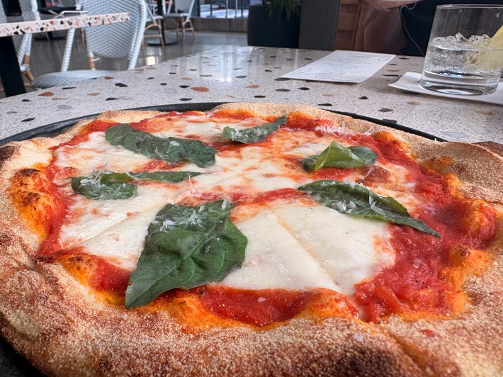At Savoca, a crisp, basil-topped pizza reflects Los Angeles’ modern Italian dining scene.