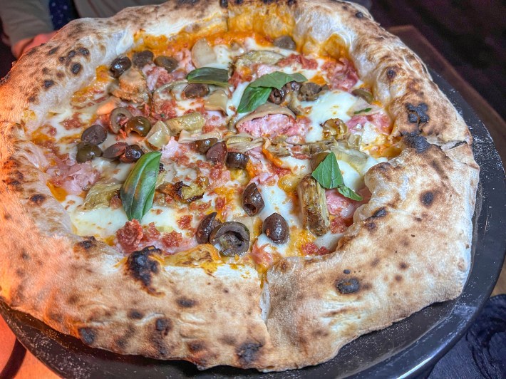Neapolitan pizza with olives and artichokes at Francesco Martucci