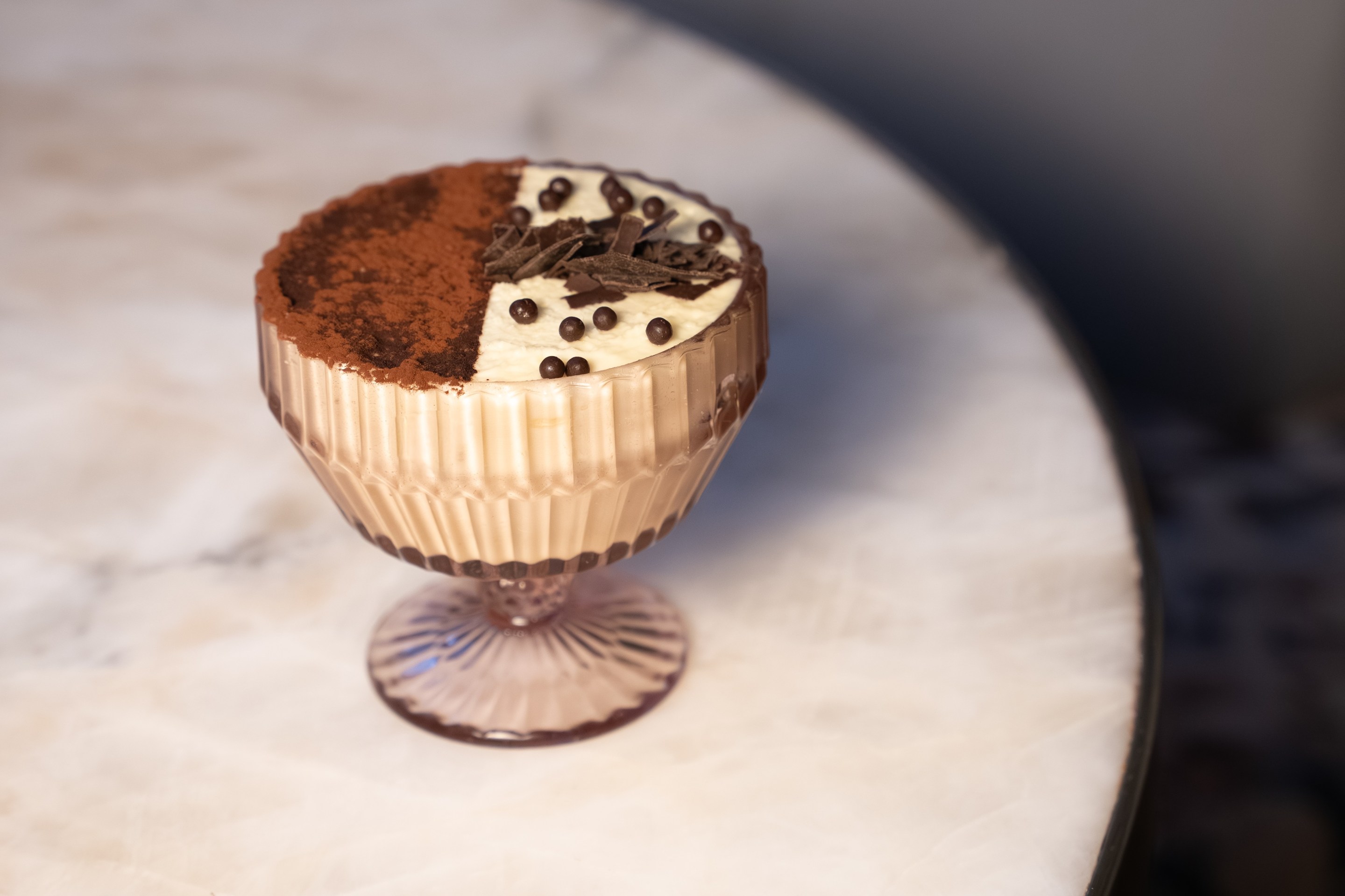 A close look at the balance of cocoa, mascarpone, and chocolate that defines the dish.