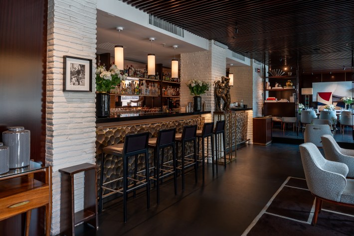 Interior bar at Caffè dell’Oro Florence with brass accents and modern design