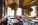 Allora Charleston dining room with colorful seating and pendant lighting