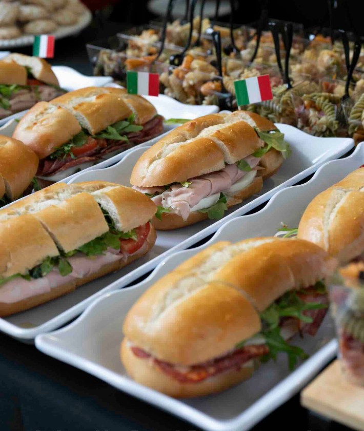 An all-inclusive spread features classic Italian sandwiches, pasta, and small bites throughout the festival.