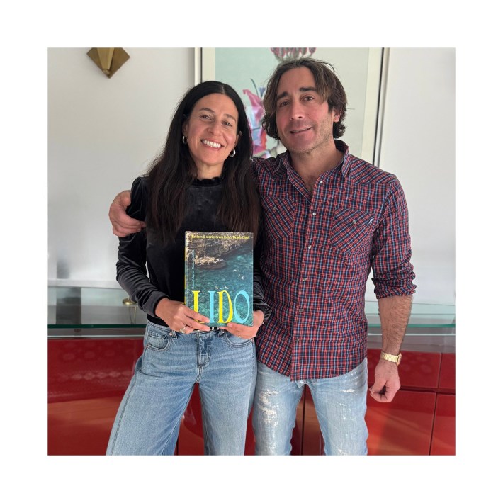Matthew Scialabba and Melissa Pellegrino, chef owners of Bufalina, with their cookbook Lido.