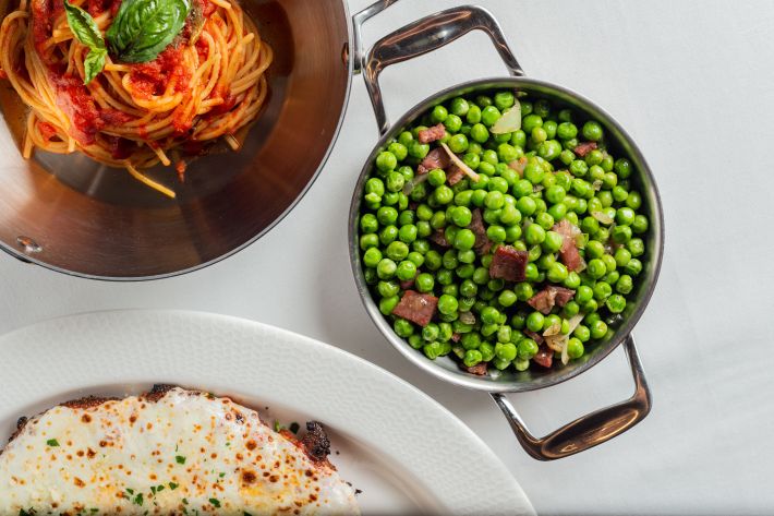 Italian dishes including spaghetti with tomato sauce and peas with pancetta