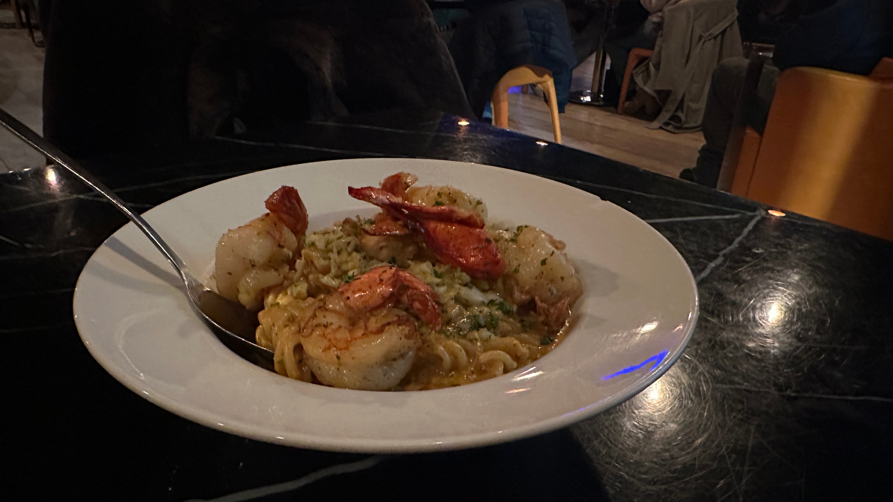 Seafood trio with lobster, scallops, and shrimp pasta at Provare Chicago