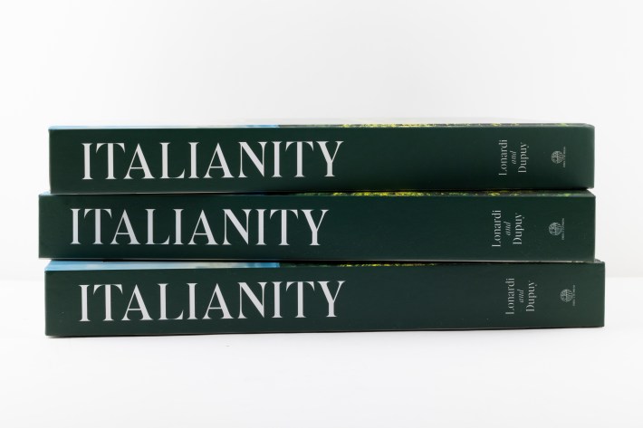 Italianity: The Culture of Italian Wine - three books stacked on top showing the green spine.
