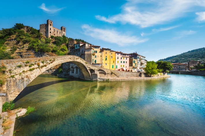 Historic stone bridge and medieval village of Dolceacqua in Liguria Italy