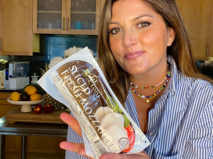 Joanna Moeller with Fresh Sliced Mozzarella from Lioni Latticini.