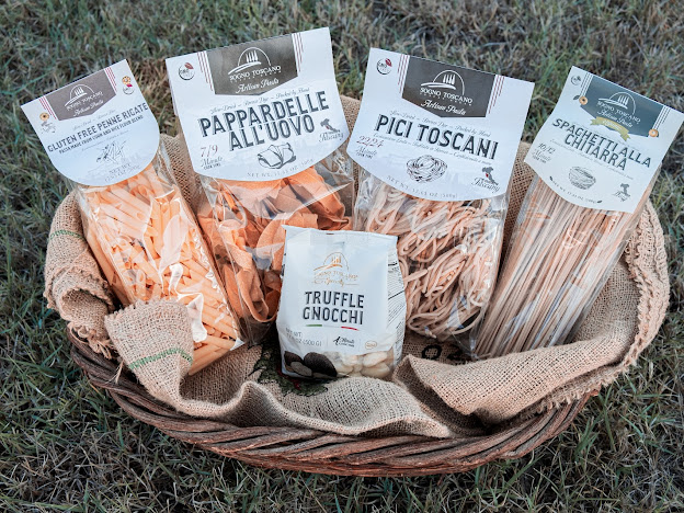 A basket of artisanal pastas from Sogno Toscano.