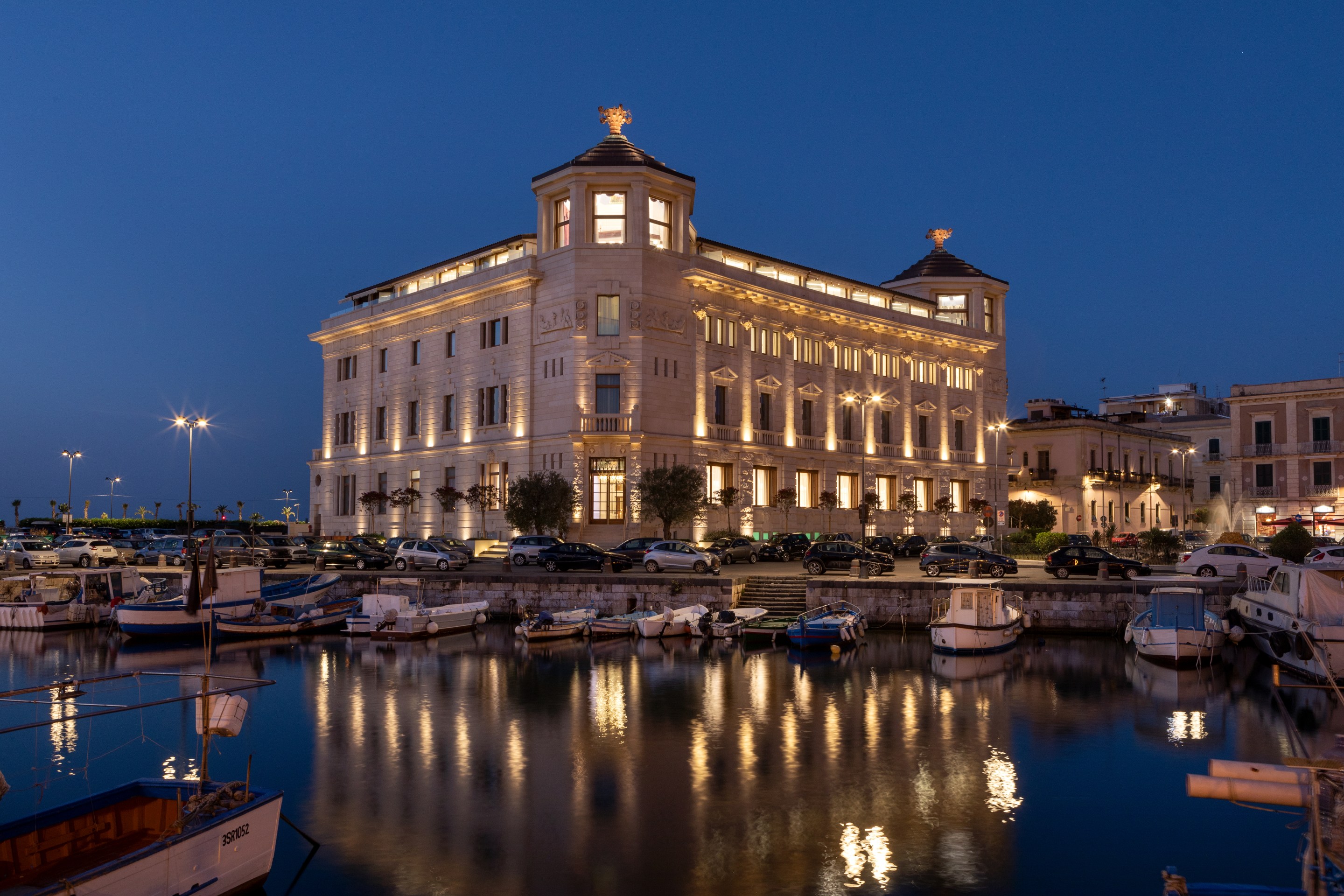 Exterior view of Ortea Palace overlooking Porto Piccolo in Siracusa Sicily
