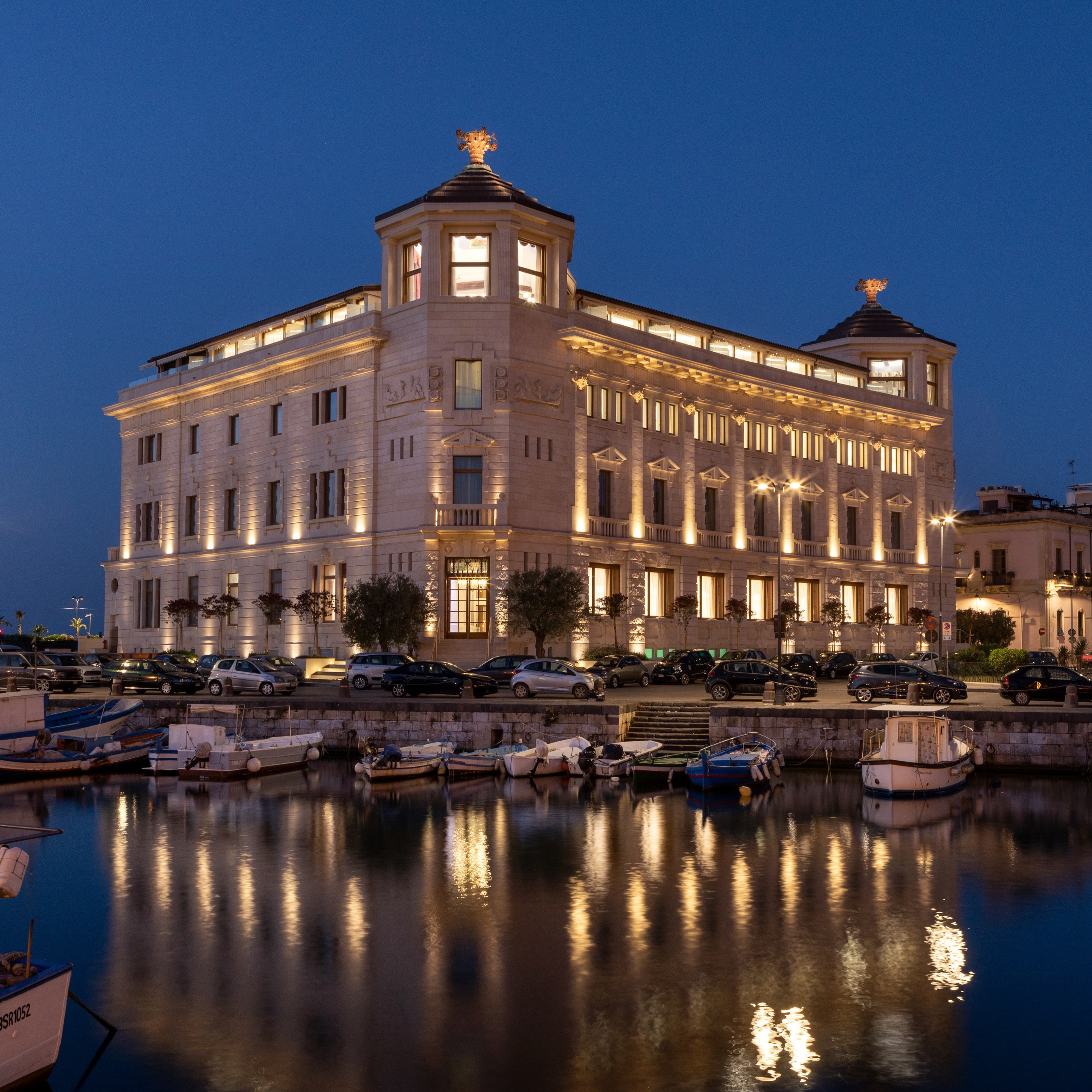 Exterior view of Ortea Palace overlooking Porto Piccolo in Siracusa Sicily