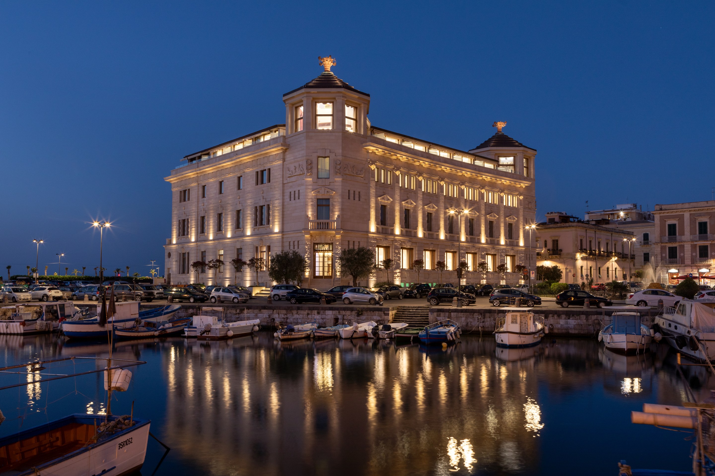 Exterior view of Ortea Palace overlooking Porto Piccolo in Siracusa Sicily
