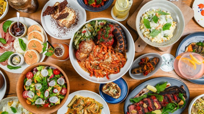 A spread of handmade pastas, cocktails, salads, and Italian dishes at Monteverde Restaurant & Pastificio