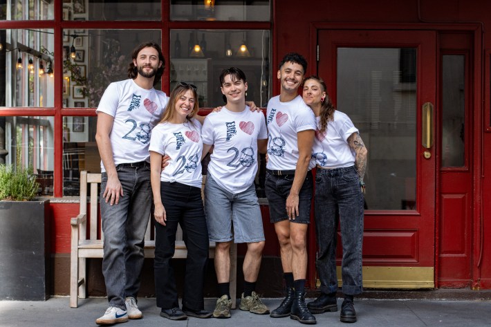 The Little Owl staff gathered outside the restaurant in Greenwich Village.