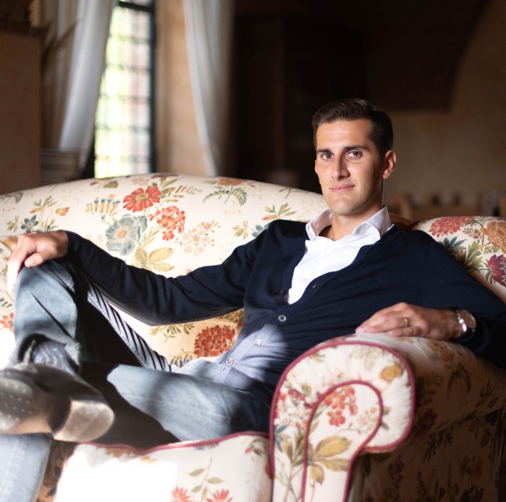 Elia Pellegrini sitting on a couch