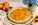Peach tart topped with glossy peaches over mascarpone filling in a buttery tart shell.