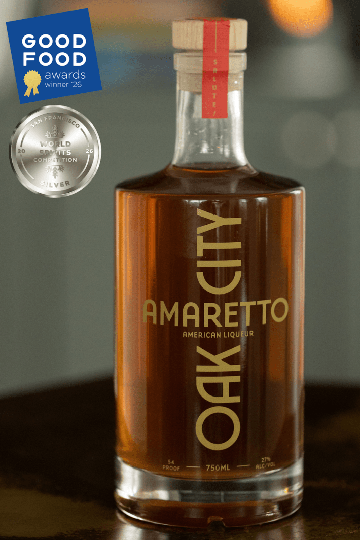 Bottle of Oak City Amaretto with Good Food Awards and San Francisco World Spirits Competition medals