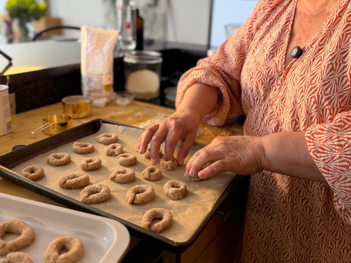 Victoria Granof shapes traditional Sicilian biscotti al vino before baking.