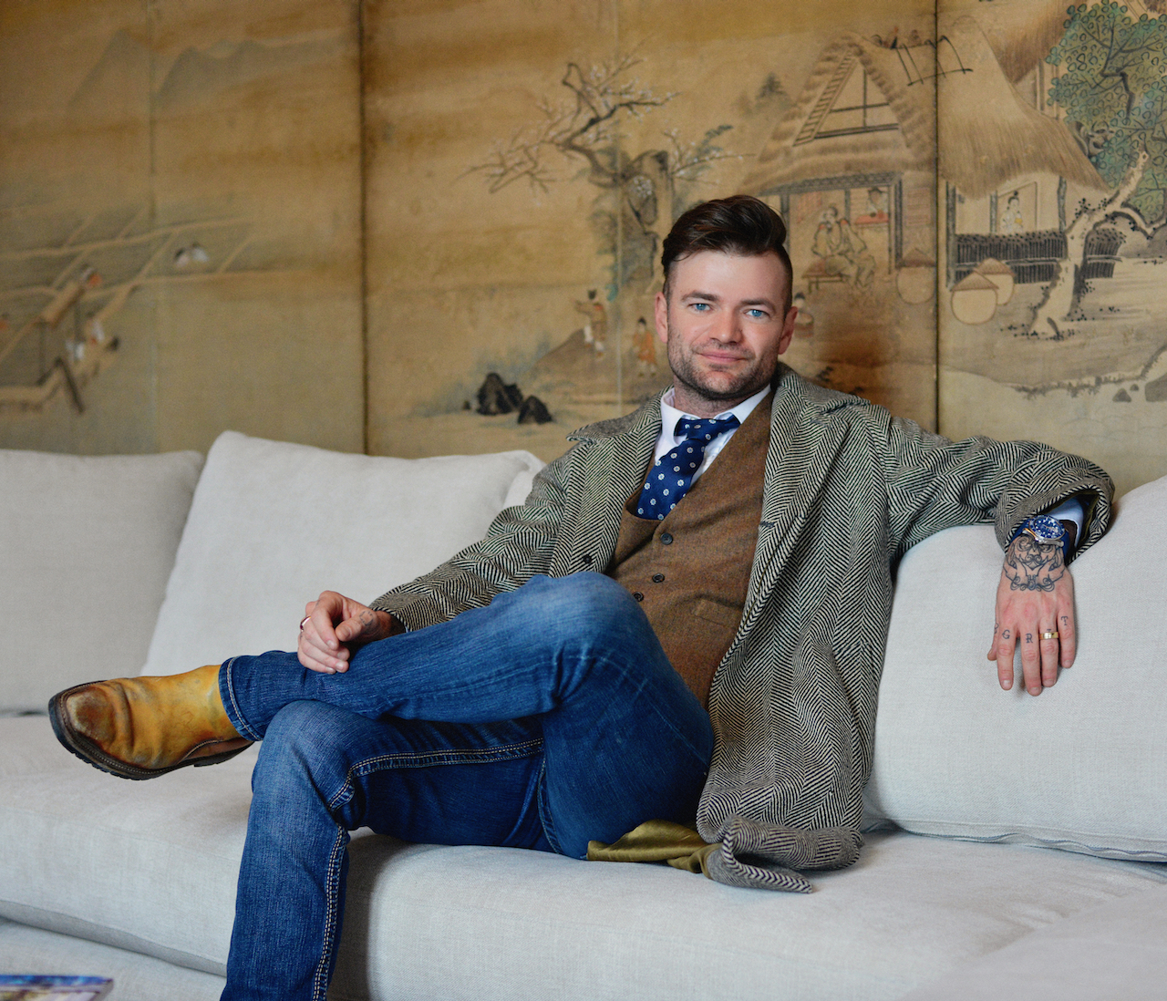 James McKinley Thomason seated inside Club Carpeneto, a restored historic palazzo in Carpeneto, Piemonte.