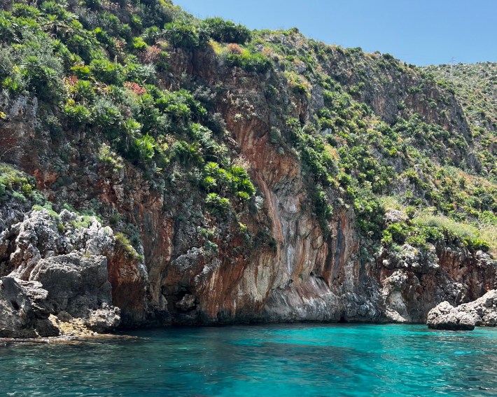 Crystal-clear water and rocky coastline at Riserva dello Zingaro